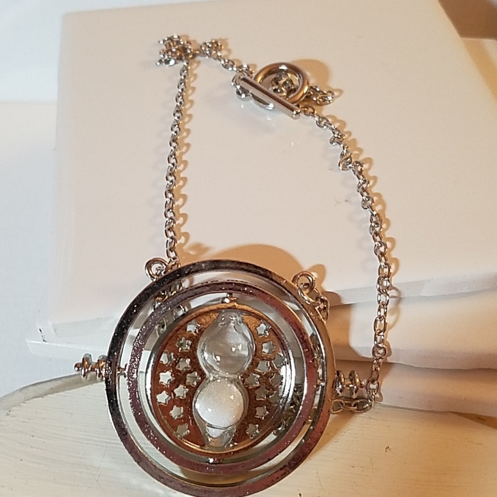 Hourglass Rotating Silver Necklace 18"